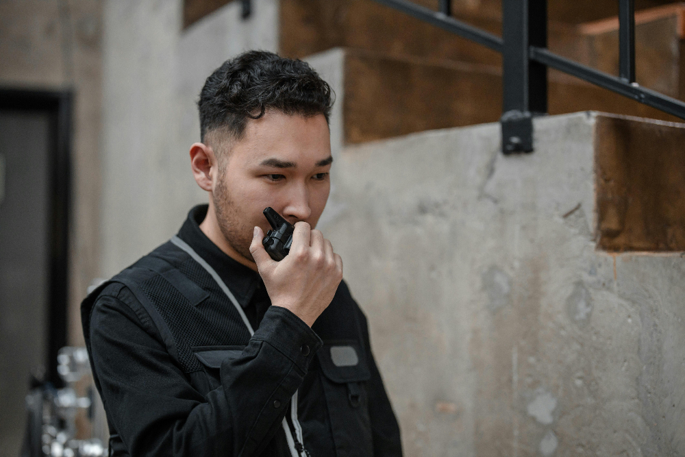 Security professional on a walkie talkie